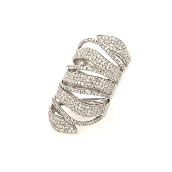An 18 karat white gold and diamond snake ring. Designed as an articulated winding pave set stylized diamond snake.